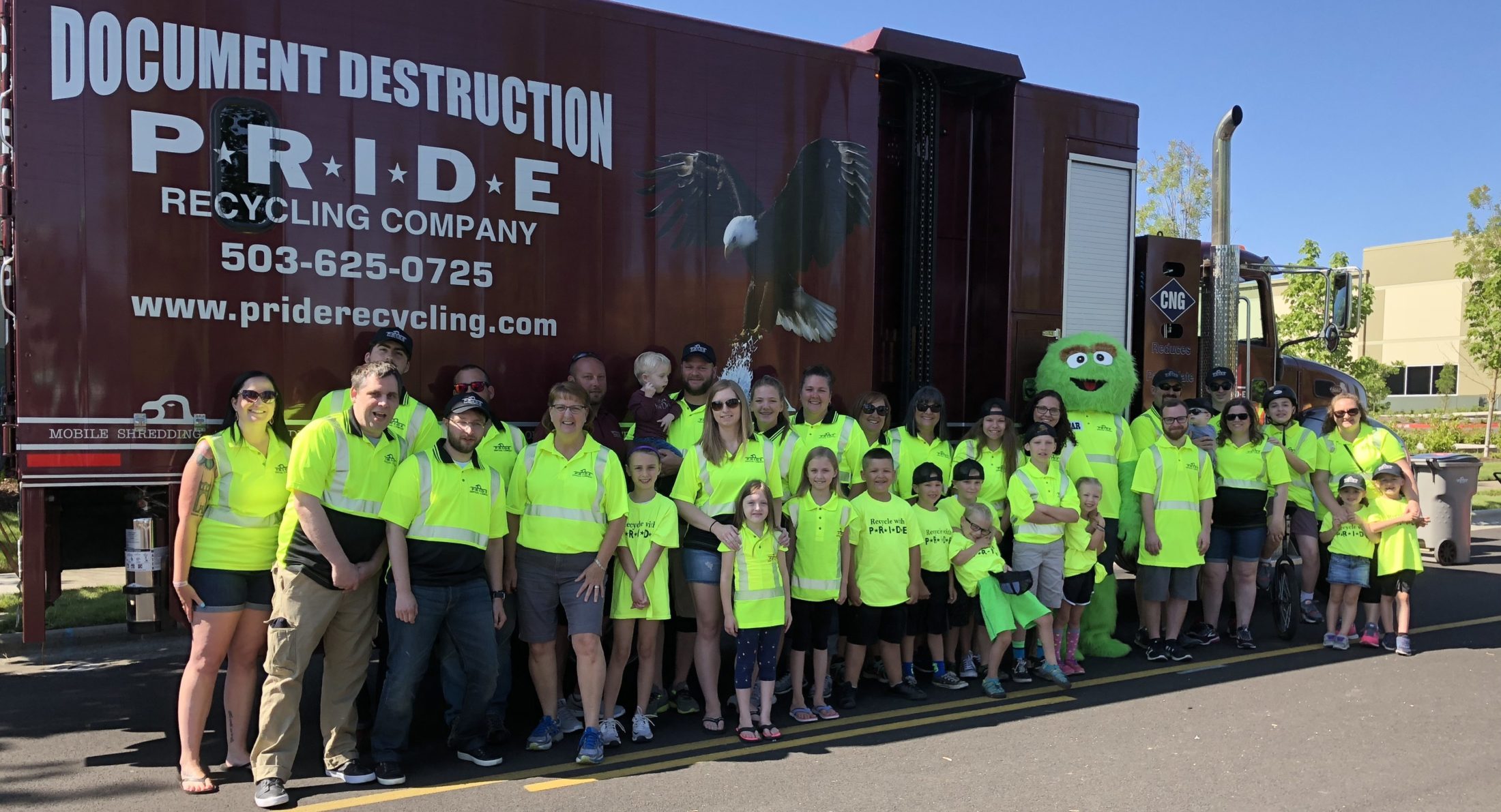 Pride's logo displayed on a garbage collection truck